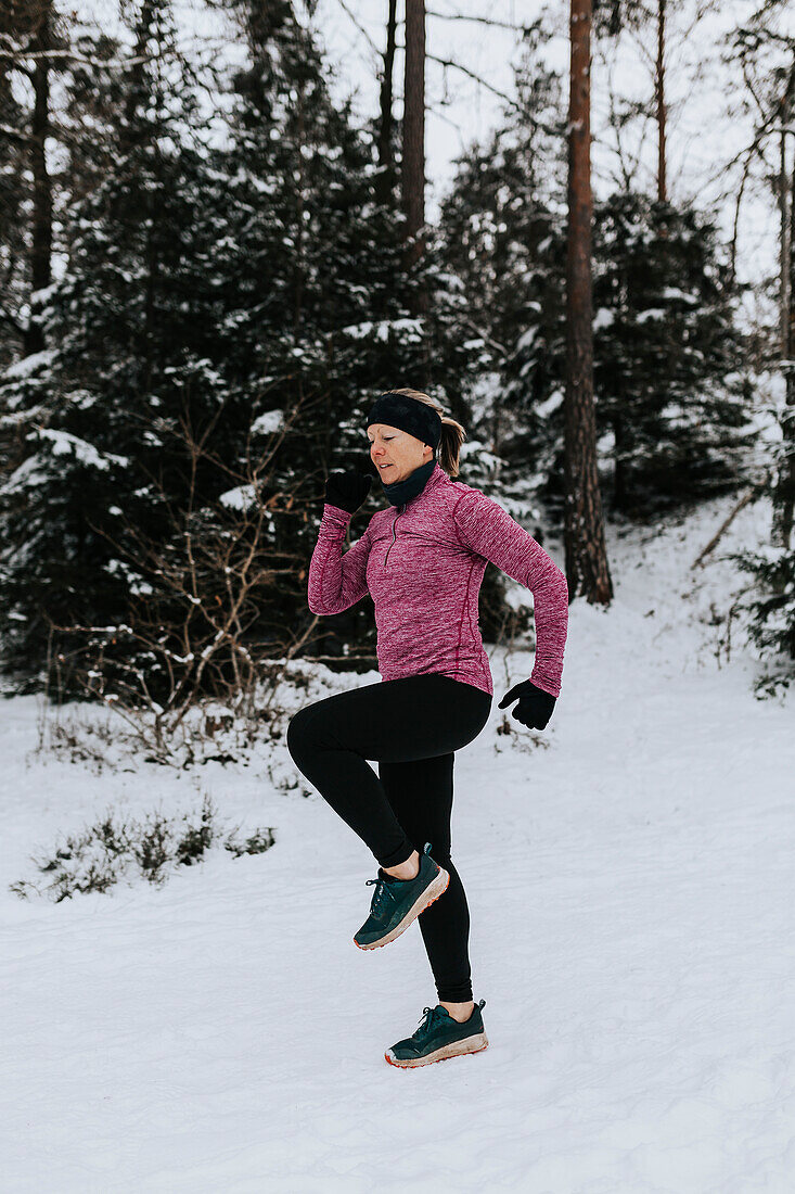 Woman exercising at winter