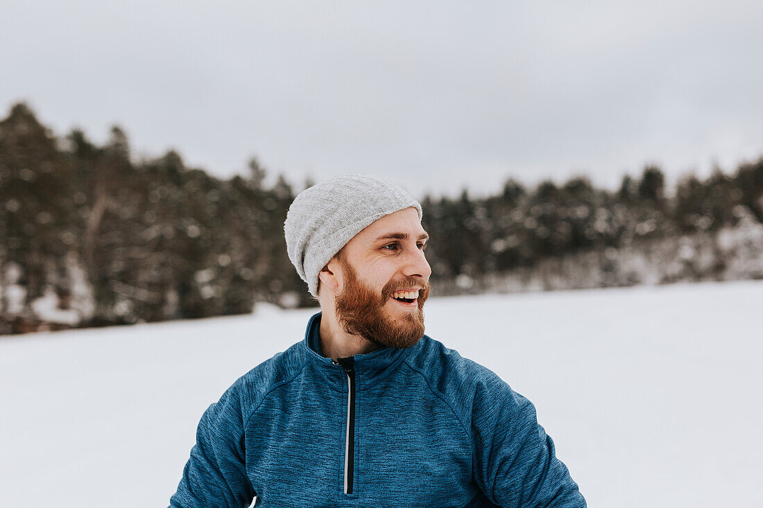 Happy man looking away