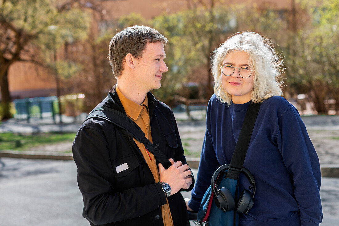 Man and woman talking together