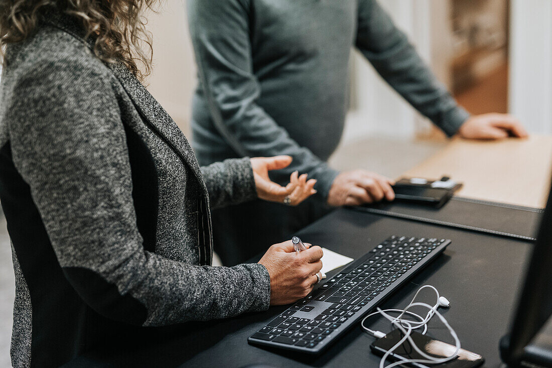 Woman's hands near keyboard