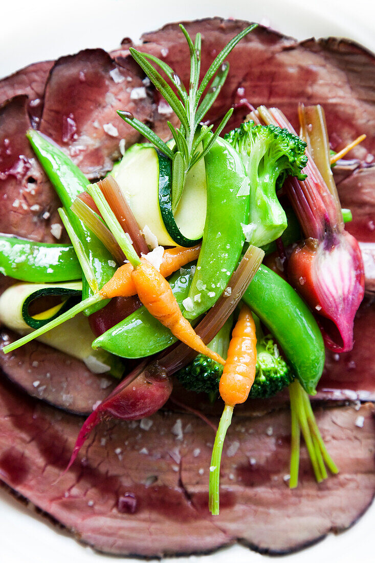 Slices of meat with vegetables