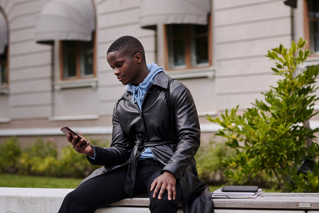 Young man using cell phone