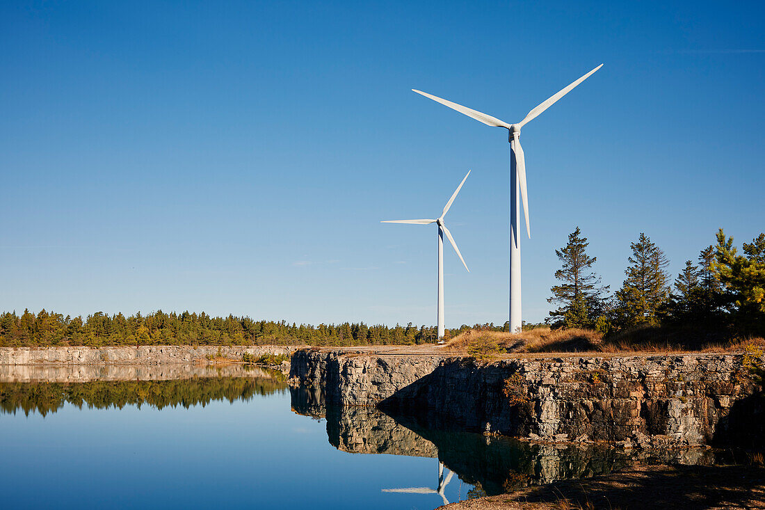 View of wind turbine at water