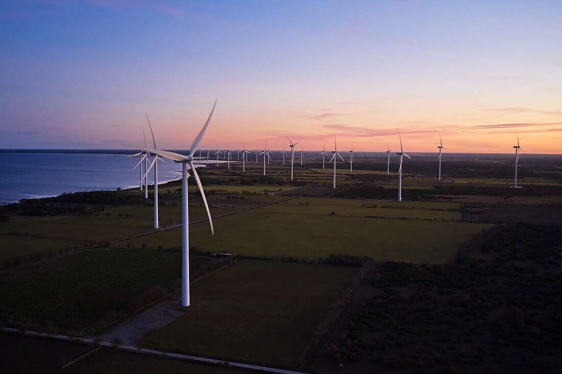 View of wind turbines at sunset