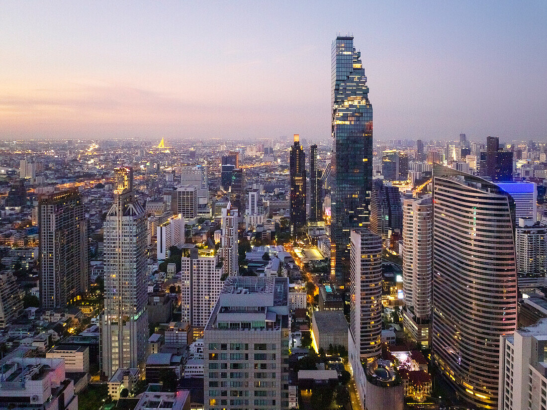 Modern cityscape of business district at sunset