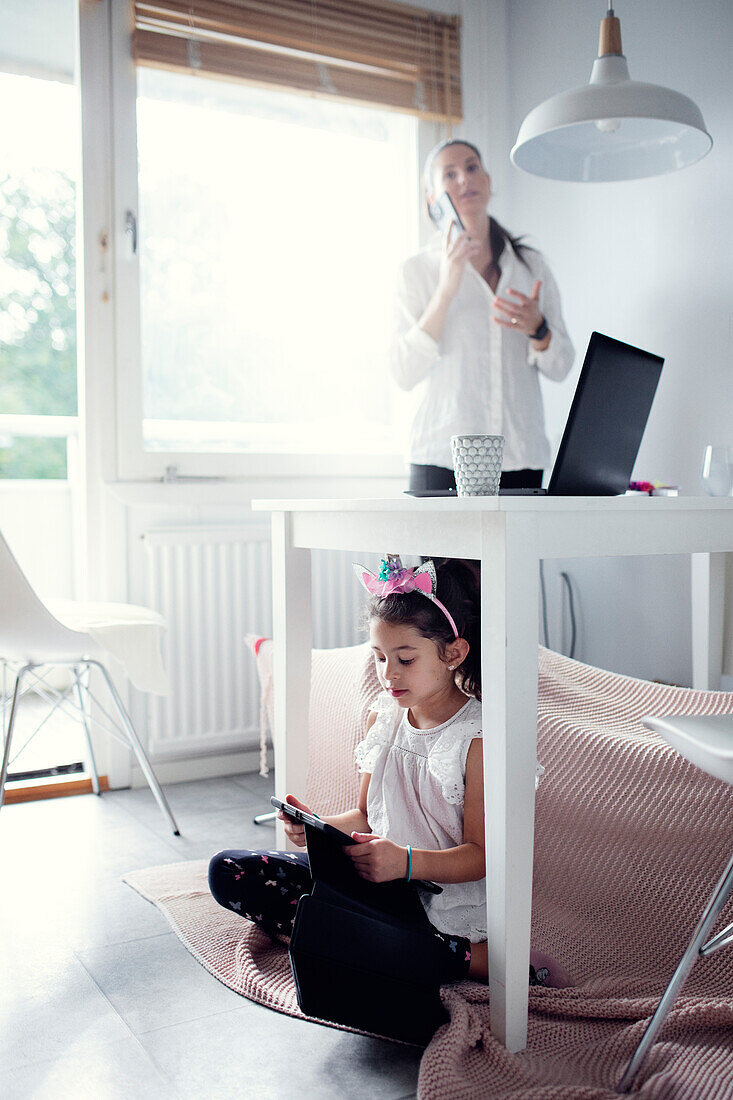 Mother and daughter at home