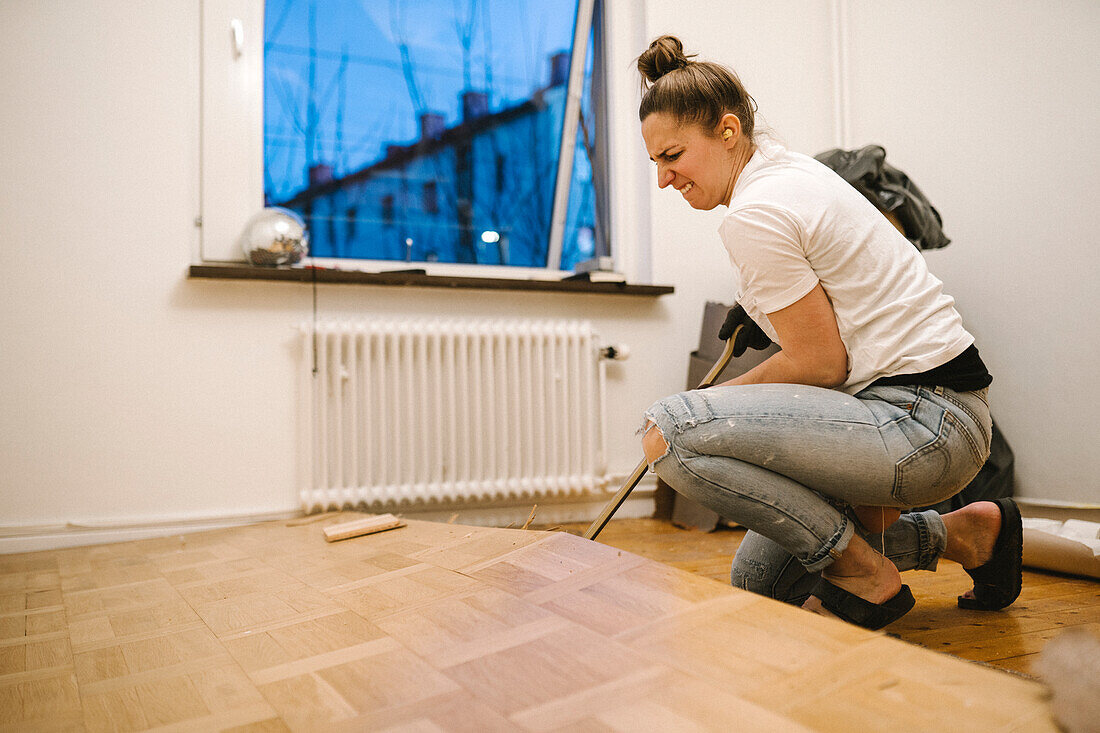 Woman renovating room