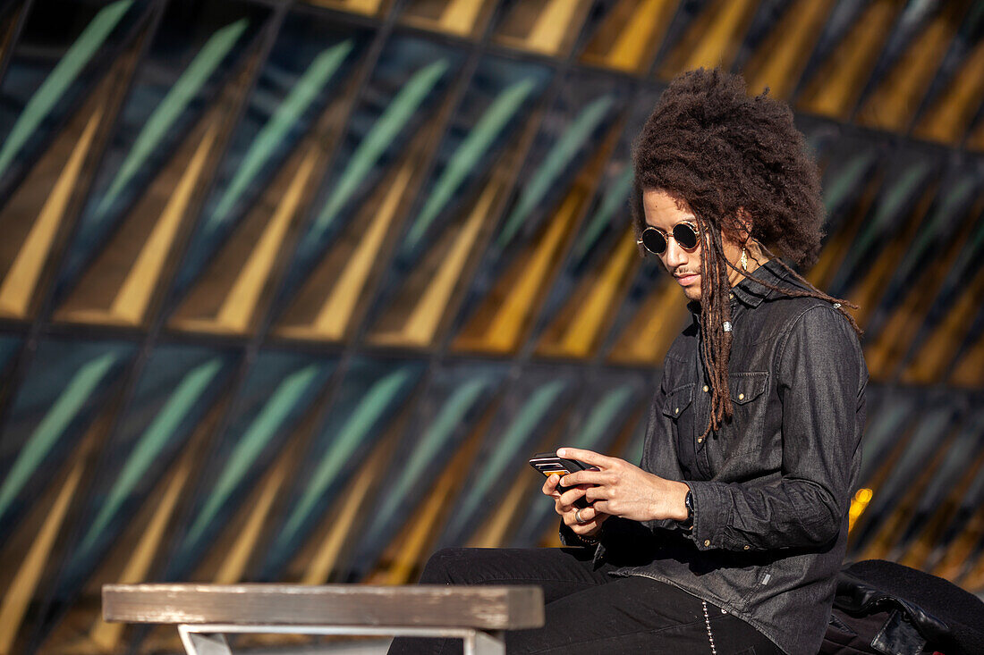 Young man using cell phone