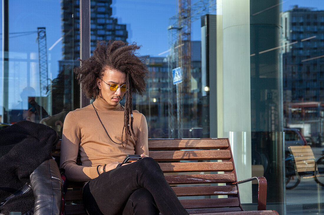 Young man using cell phone