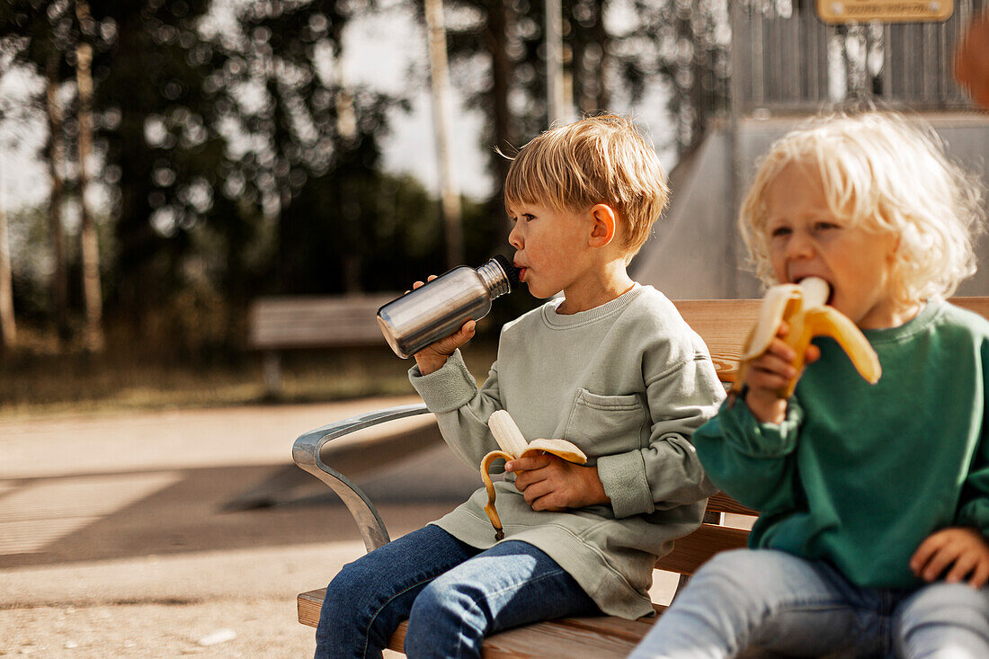 Children eating at playground