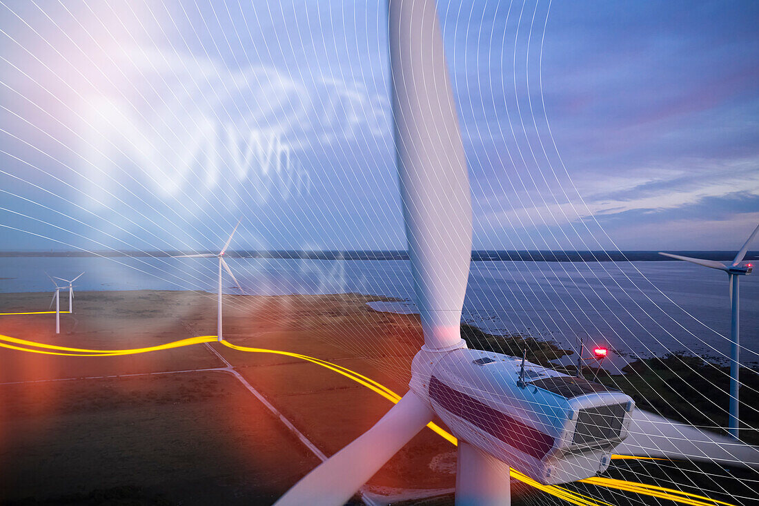 Aerial view of wind turbines at sea coast