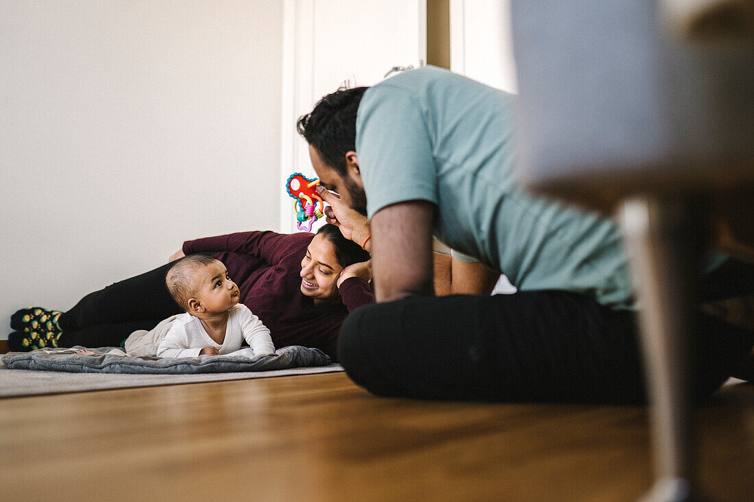 Father and mother with baby