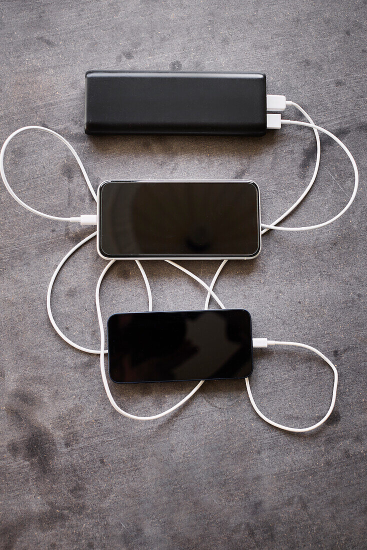 Cell phones connected to power bank