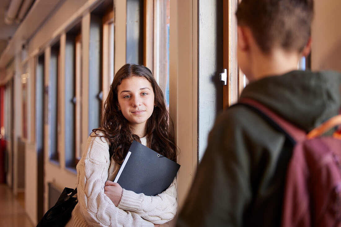 Teenage girl looking at camera