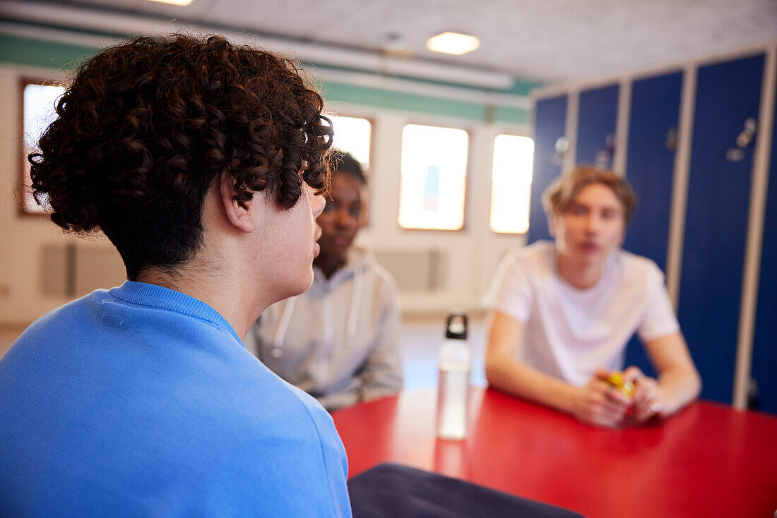 Teenagers in locker room