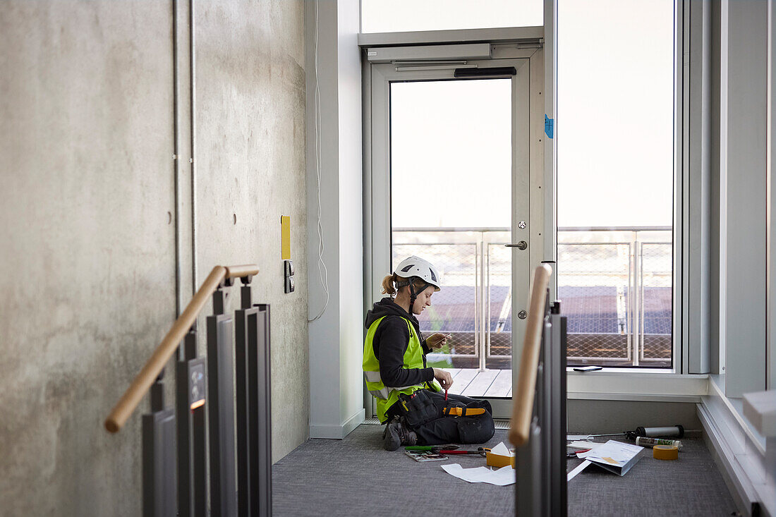 Woman working at building site