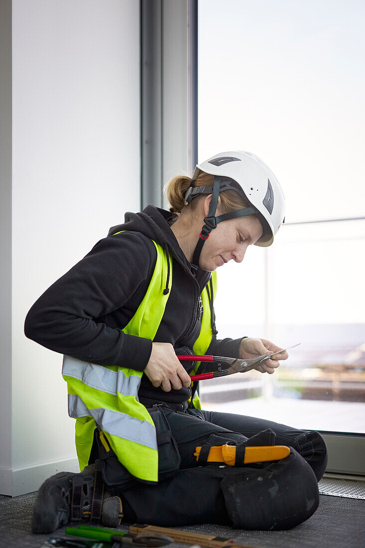 Woman working at building site