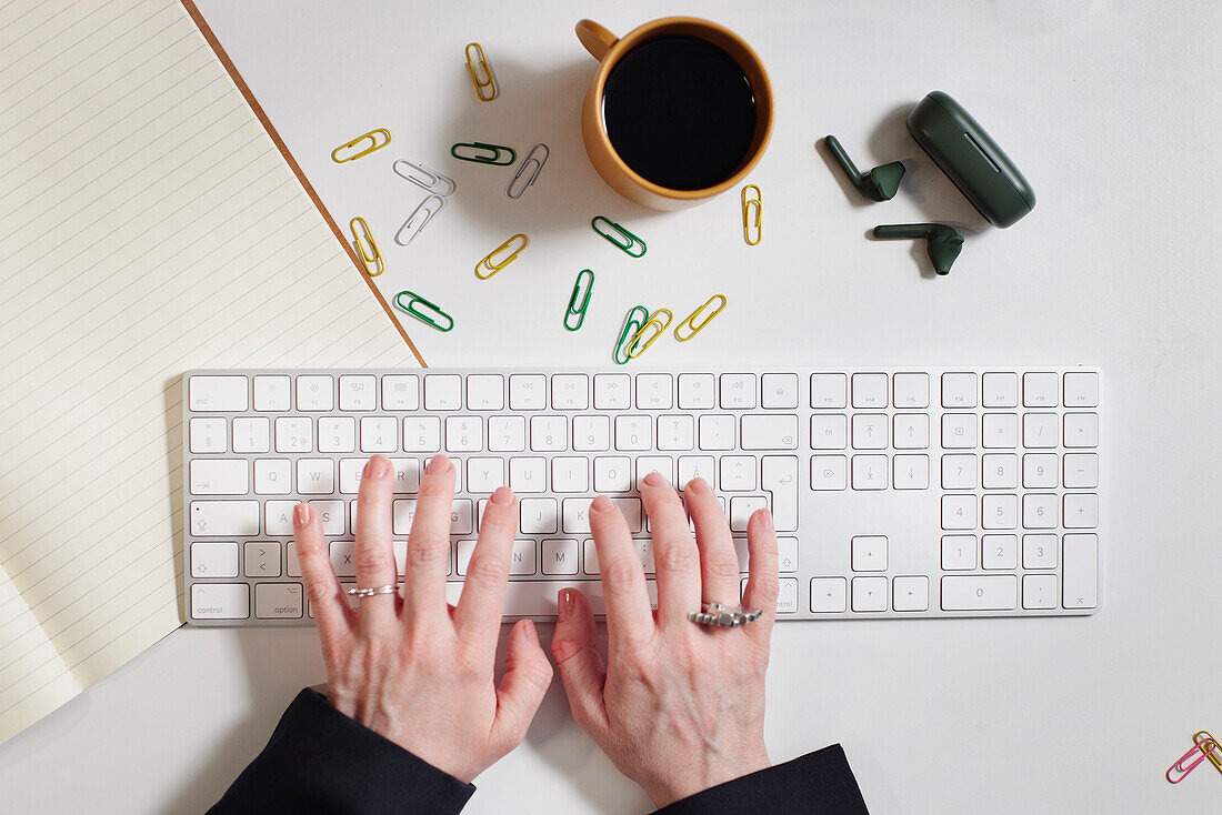 Woman's hands using laptop