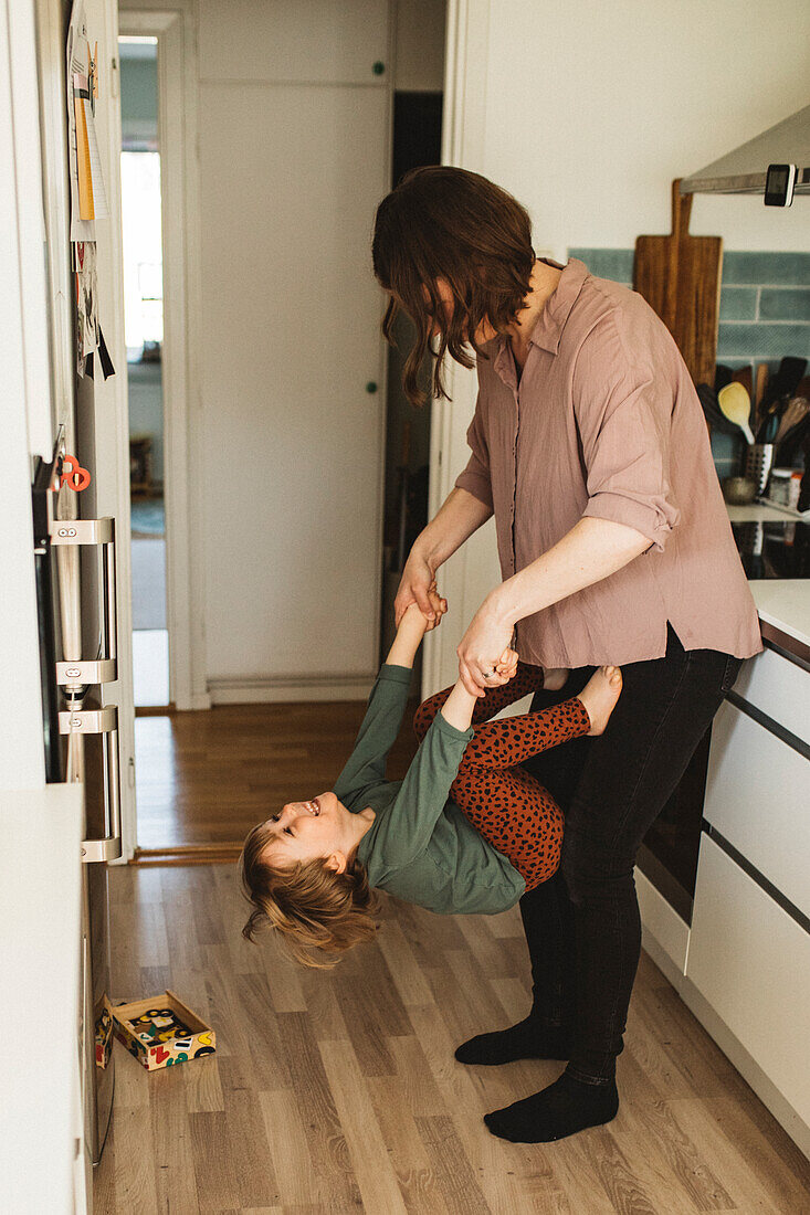 Mother and son playing together