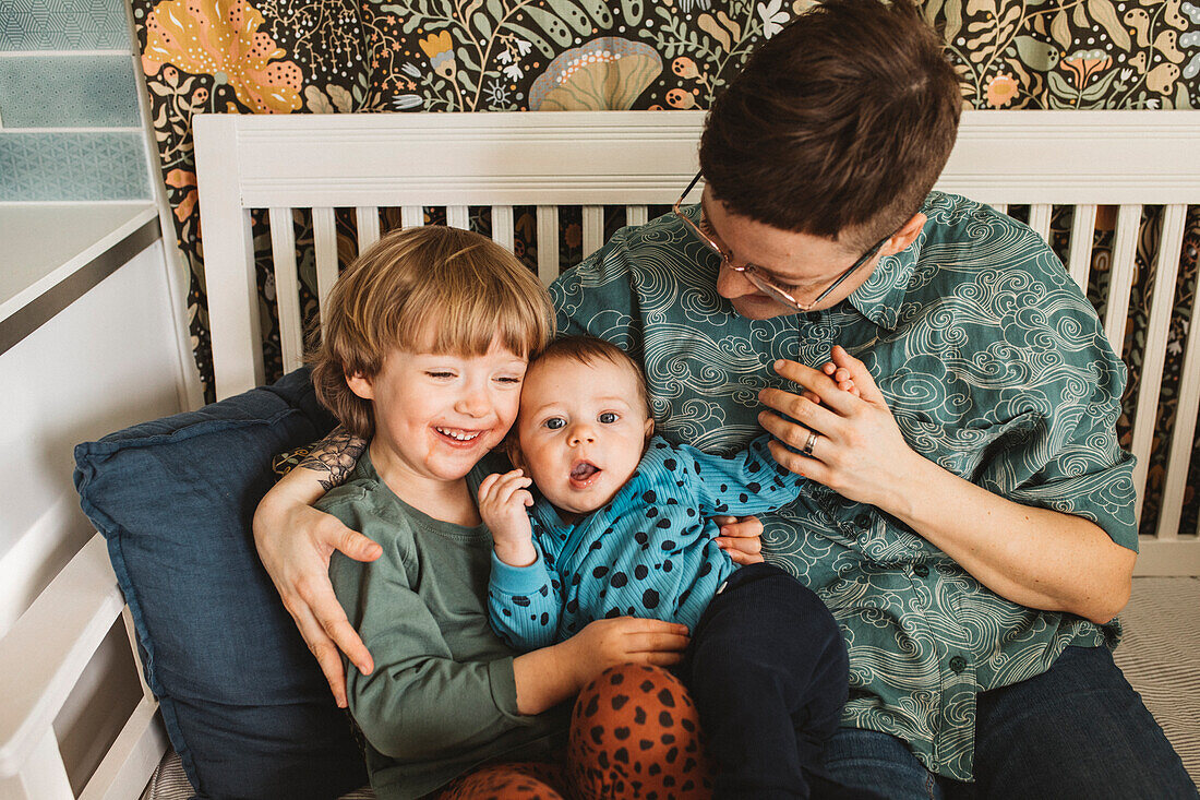 Mother with children sitting together