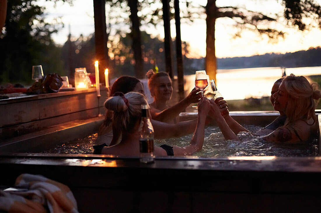 Female friends relaxing in hot tub