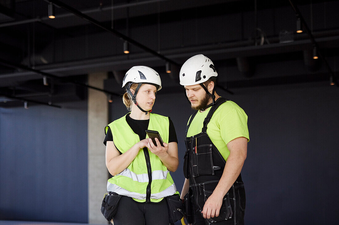 Workers talking together