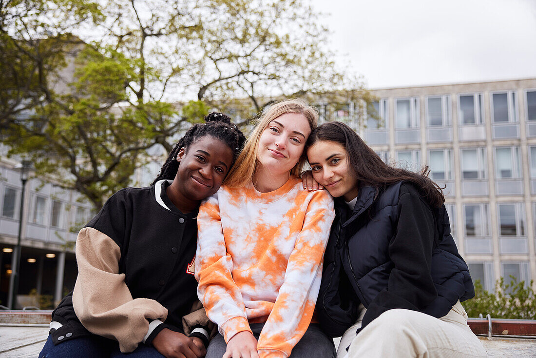 Three young female students at campus