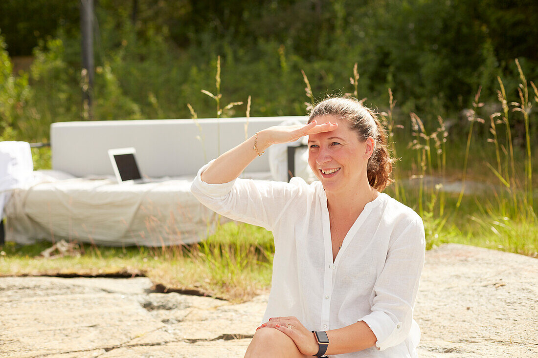 Smiling woman looking away