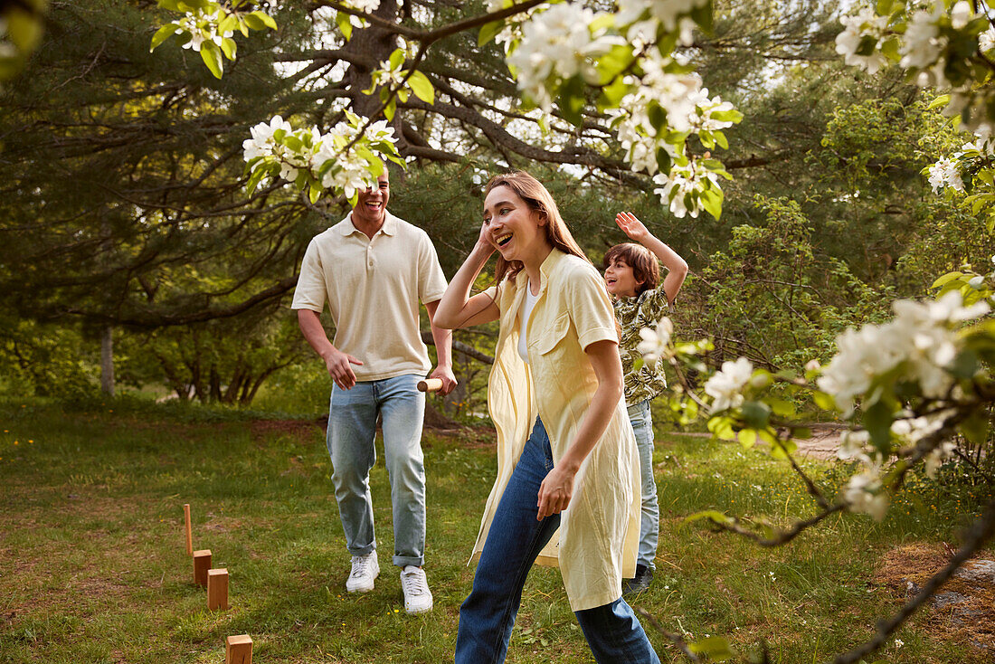 People playing molkky outdoors