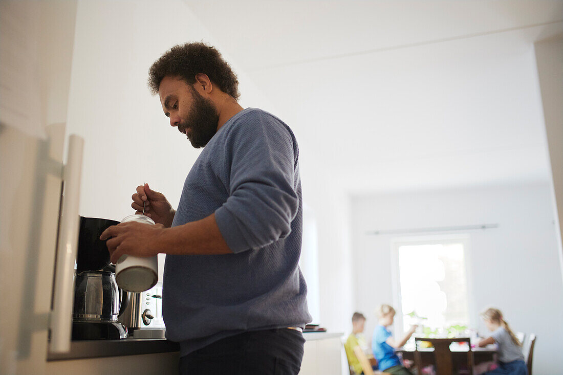 Man making coffee at home