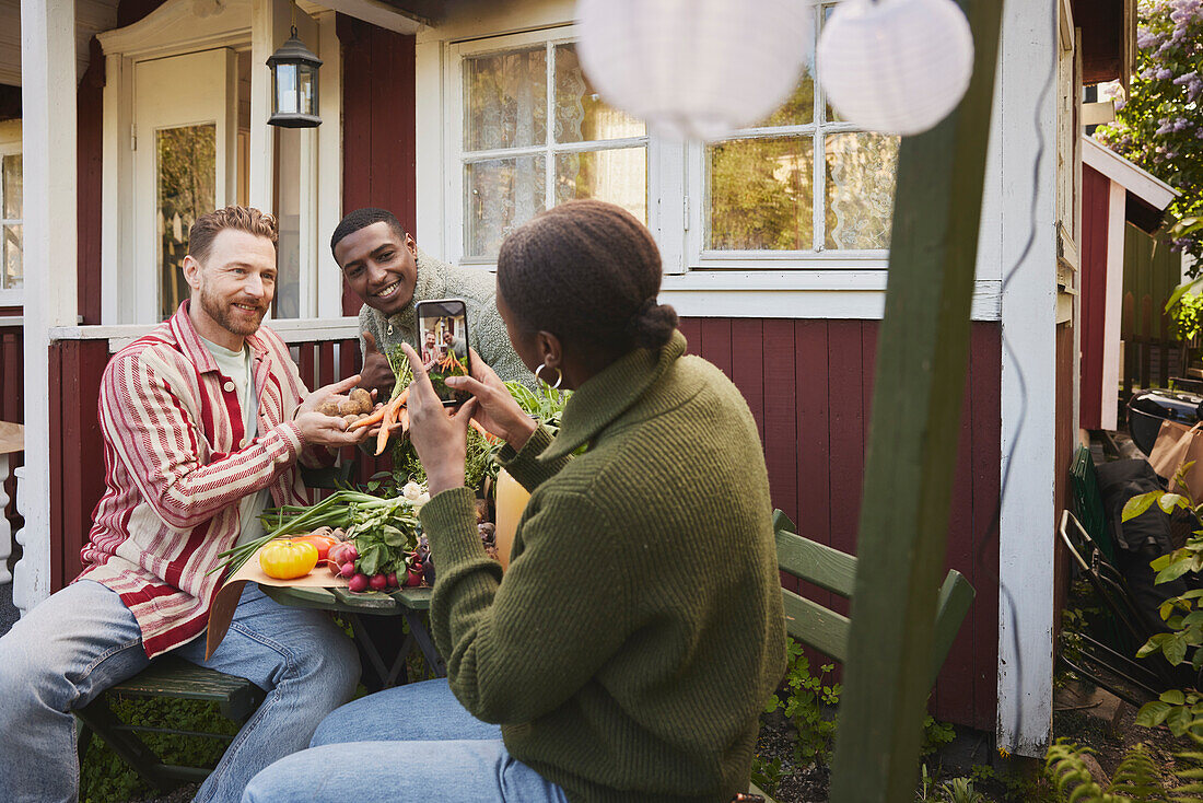 Friends sitting in garden