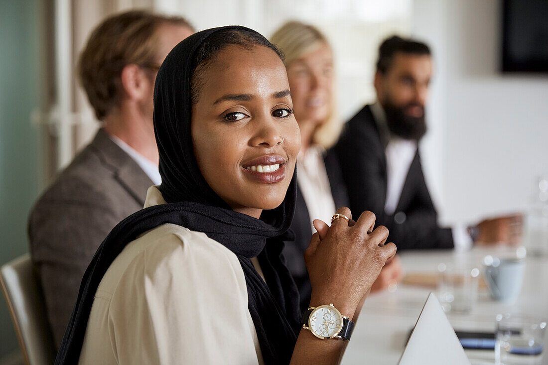 Young woman at business meeting