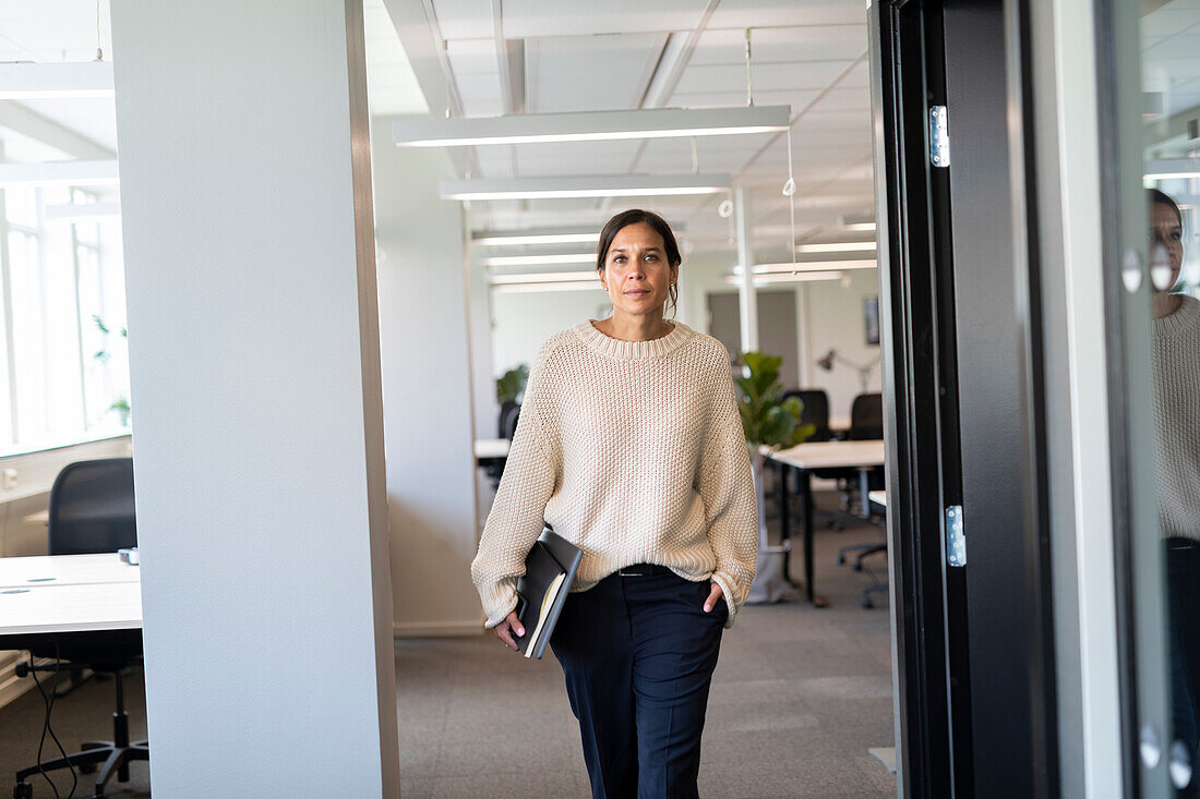 Woman walking in office