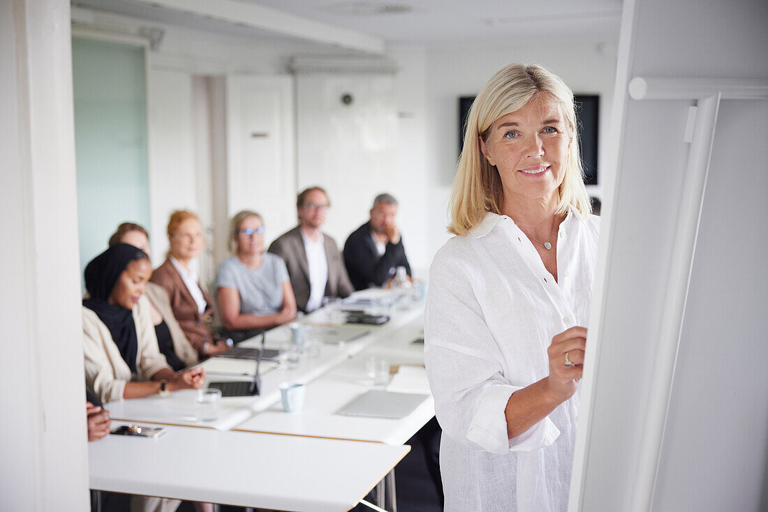 Woman having presentation at business meeting