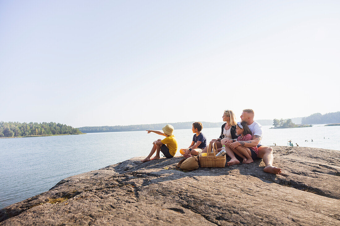 Family relaxing at sea