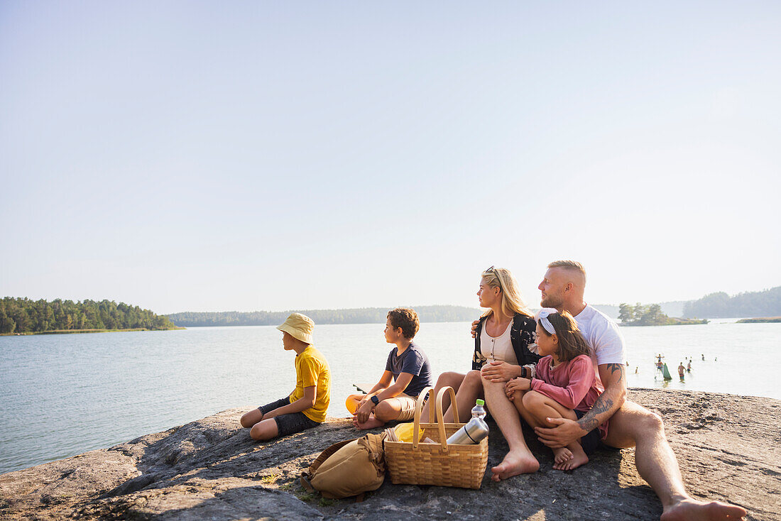 Family relaxing at sea