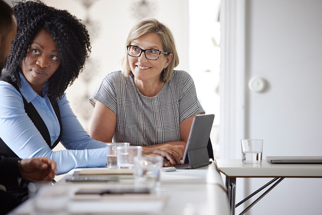 Smiling businesswoman at meeting