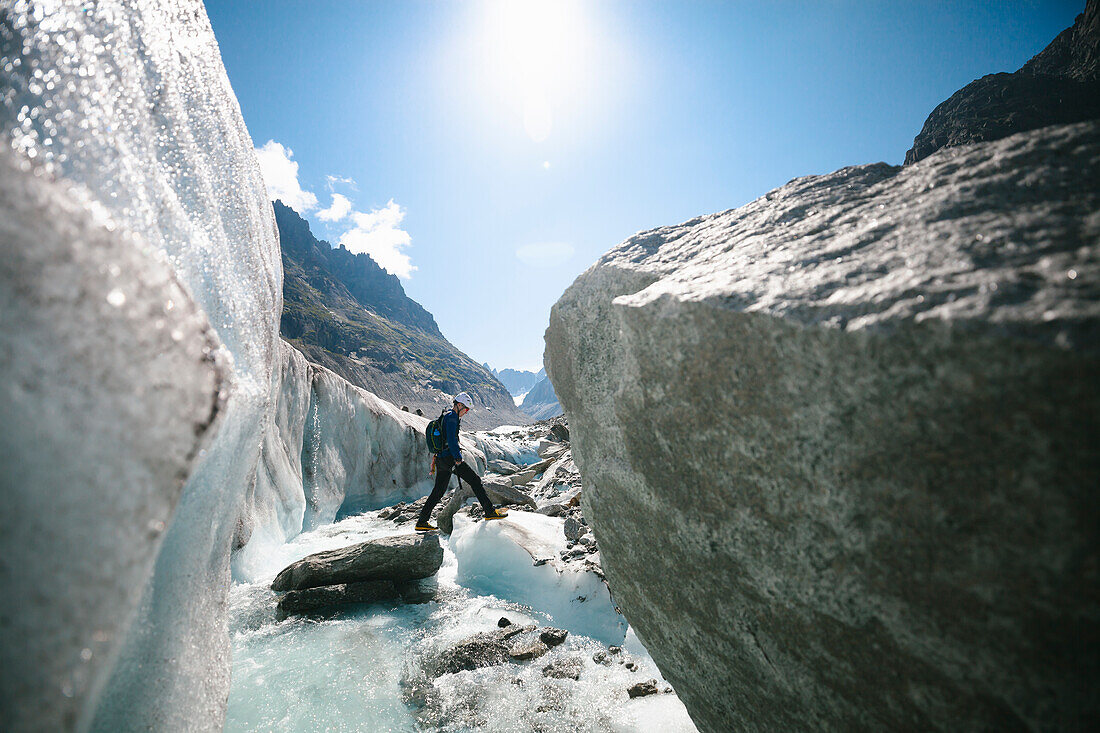 Man exploring mountains in winter