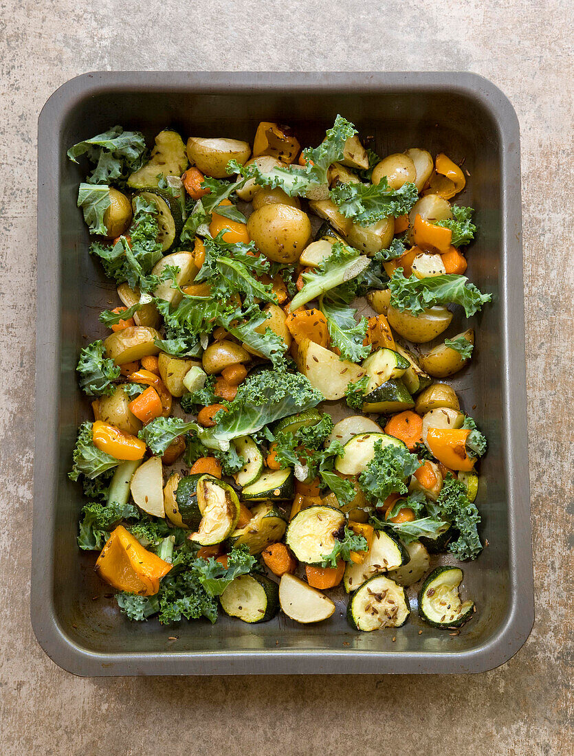 Roasted potatoes, carrots, and kale with cumin