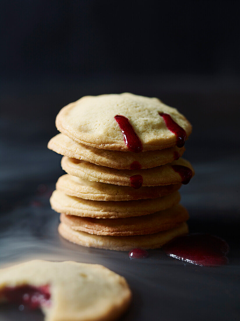 Biscuits filled with blood-red strawberry sauce for Halloween