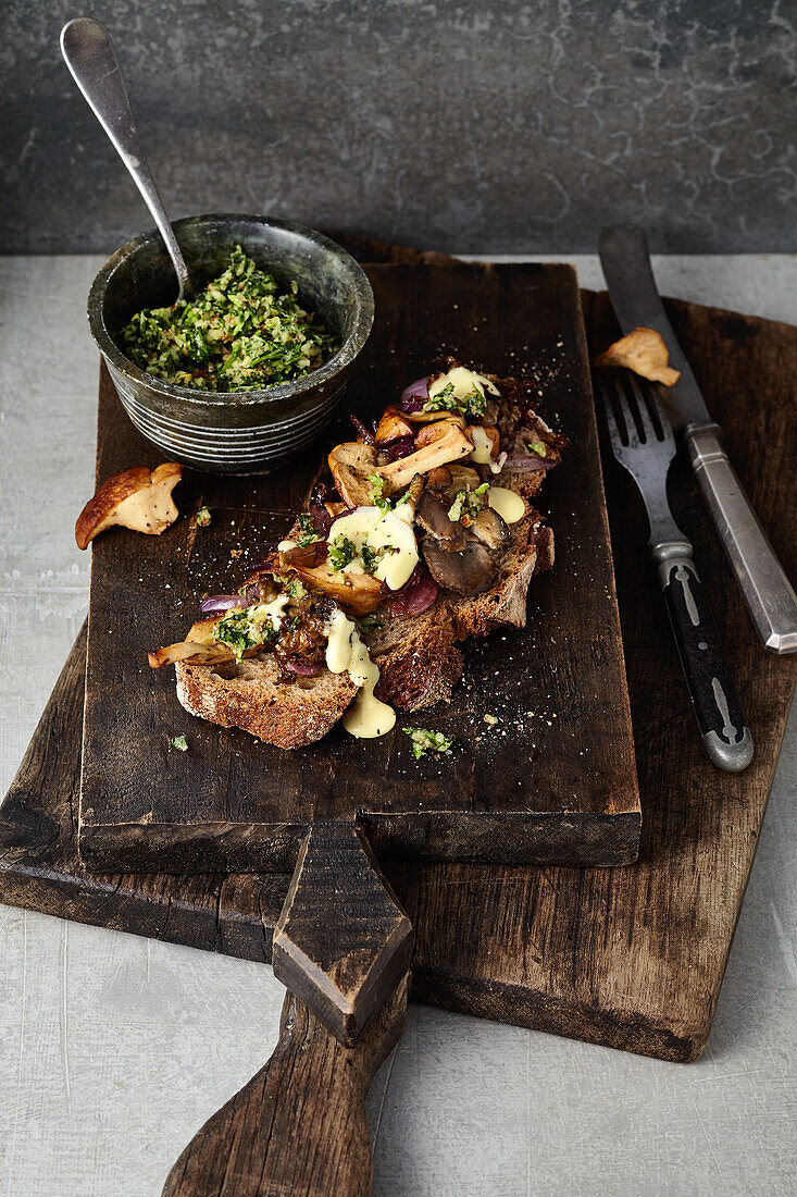 Open face Mushroom sandwich with hollandaise sauce and parsley almond gremolata