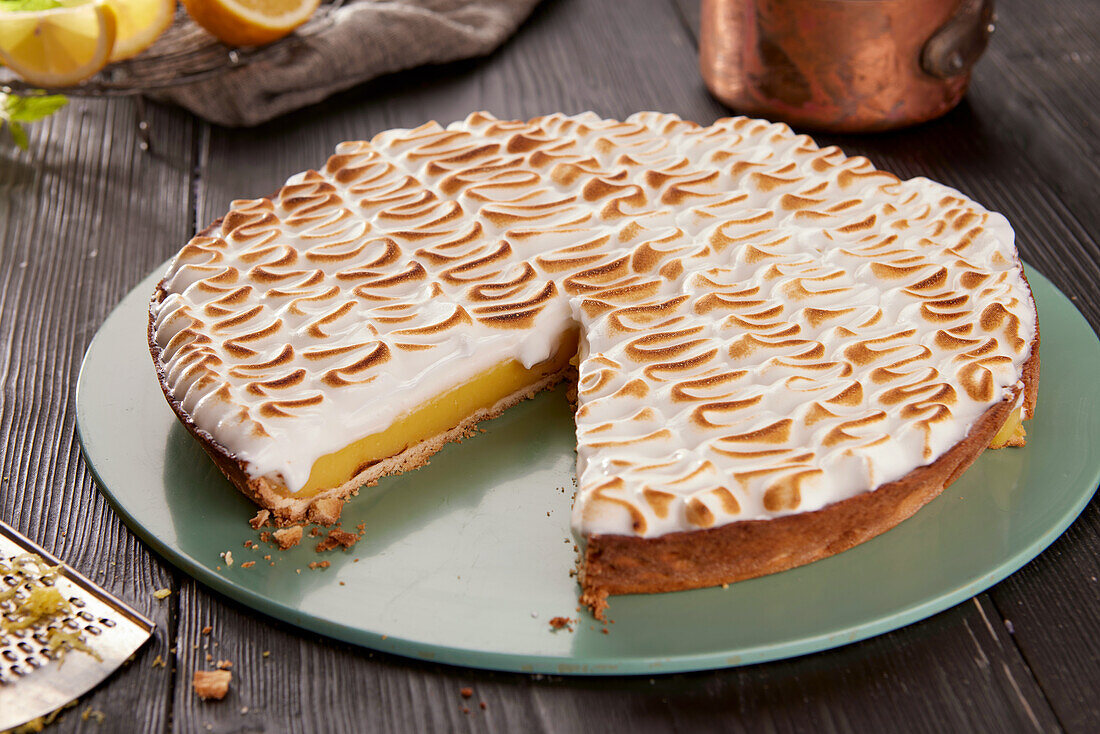 Lemon meringue pie with slice removed