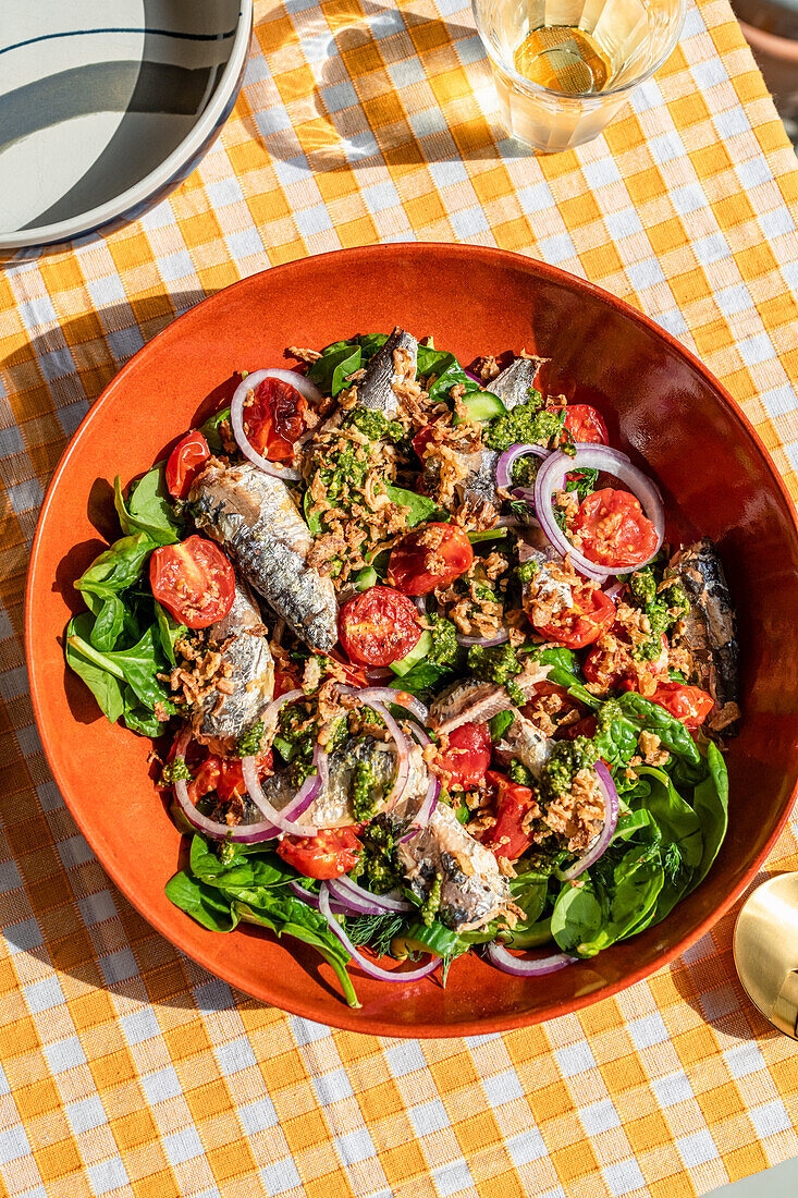 Salad of Portuguese Sardines with Roast Tomatoes and Fresh Spinach