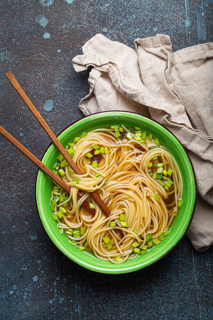 Lo Mein noodles with broth and spring onions (Asia)
