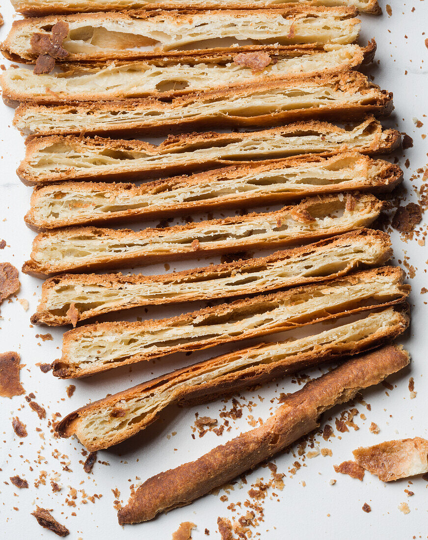 Baked puff pastry cut into strips