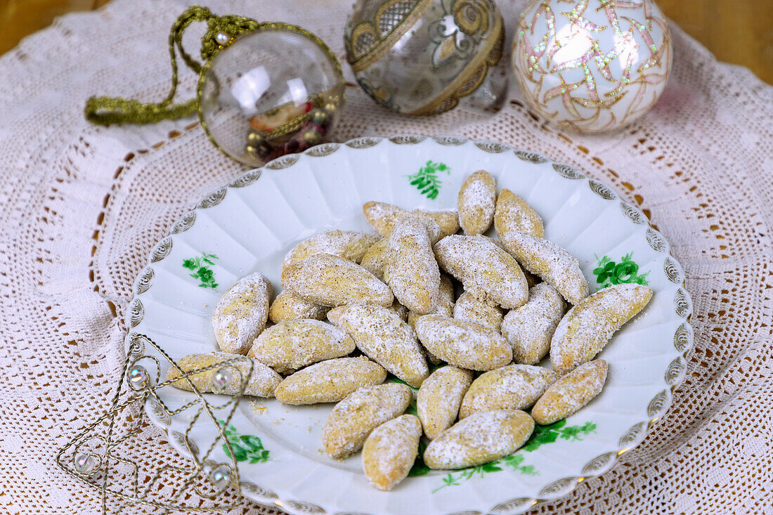 Vanilla crescents arranged with Christmas decorations