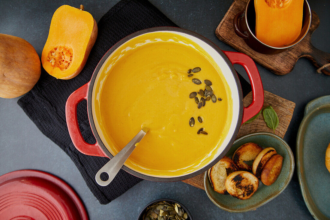 Pumpkin soup with toasted bread and pumpkin seeds