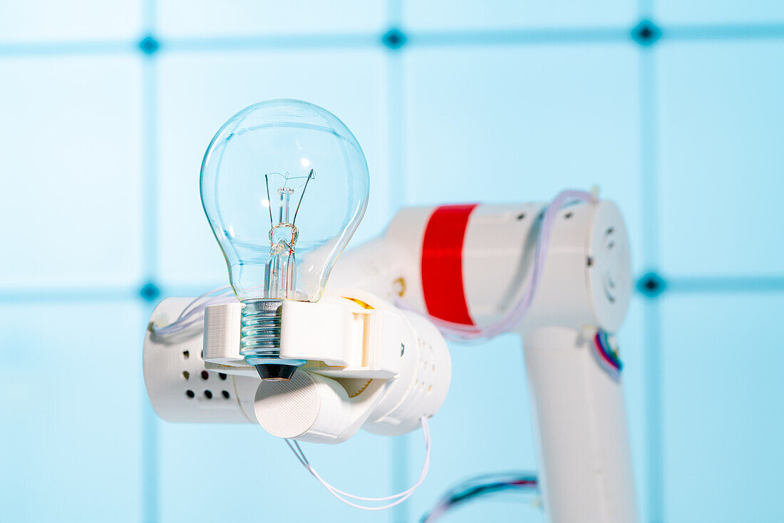 Robotic arm holding bulb