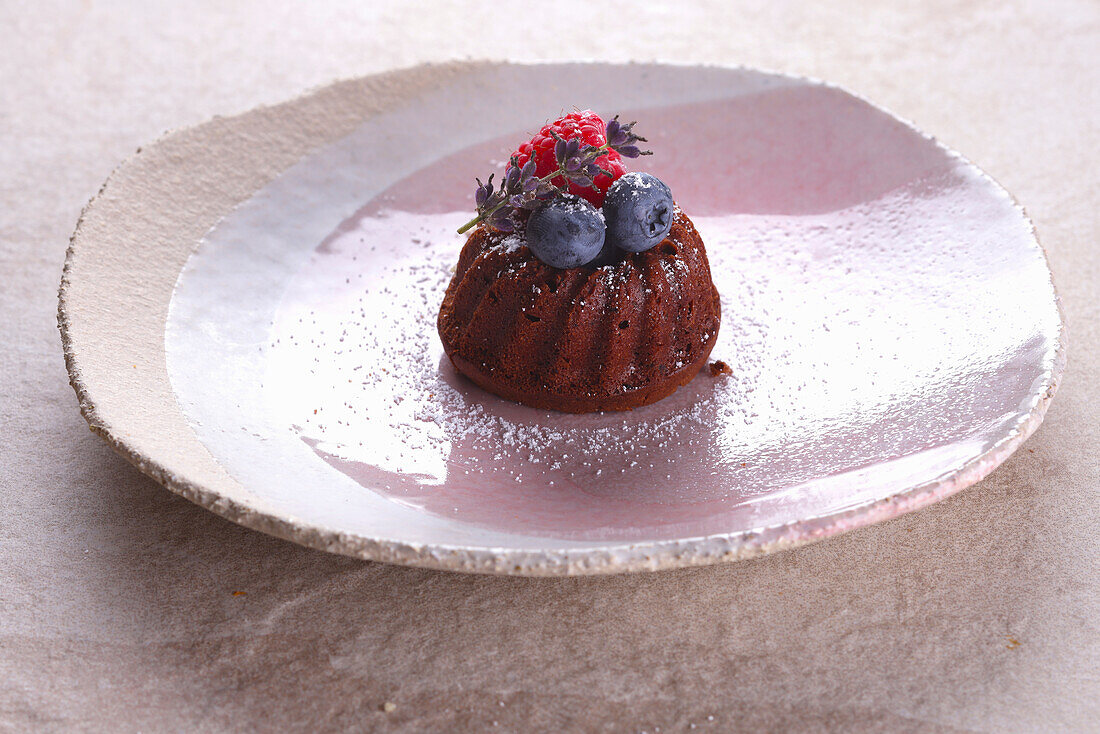 Mini Bundt Cake garnished with berries