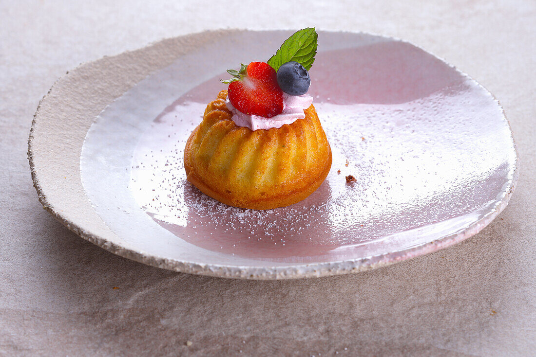 Mini Bundt Cake garnished with berries